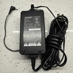 Sharp UADP-0312TAZZ Ac Power Adapter 7V Dc 1.3A. Fixed Price $19.99.