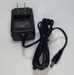 Switching Power Adapter Model FM120010-US 12V 1A. Fixed Price $13.85.
