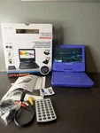 Sylvania SDVD7027-C Portable Player Purple W/remote Tested. Fixed Price $35.00.
