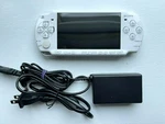 Sony Psp 2000 - Ceramic White Console + 4GB Memory Charger Good Condition. Fixed Price $129.95.