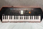 Casio SA-76 44-KEY Electronic Keyboard Black/orange Built-in Speaker Adapter. Fixed Price $60.00.