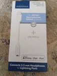 Insignia- Lightning To 3.5 Mm Headphone Adapter White. Fixed Price $8.00.
