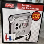Grease Monkey Portable Air Compressor Inflates Standard Car Tire 12VOLT Led Ligh. Fixed Price $21.69.