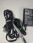 Genuine Canon CA-560 Compact Power Adapter 9.5V 60VA. Fixed Price $7.95.