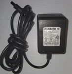 Medela 9VDC Oem Power Adapter Supply 920.7010 Rev U090100D31. Fixed Price $7.99.