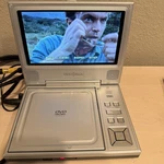Vintage 2006 Insignia 7" Player NS-7PDVD W/ Original Power Supply Cords. Fixed Price $50.00.