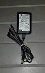 Qili QL-09002B-B1201000H Power Supply 12V- 1000MA Oem Ac/dc Adapter Charger. Fixed Price $10.00.