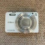 Nikon Coolpix S7000 Digital Camera 16.0 Mp 20X Optical Zoom White Fast Shipping. Fixed Price $208.59.