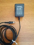 Sharp Plug In Class 2 Transformer Ac Adaptor Model Number EA-63A. Fixed Price $20.00.
